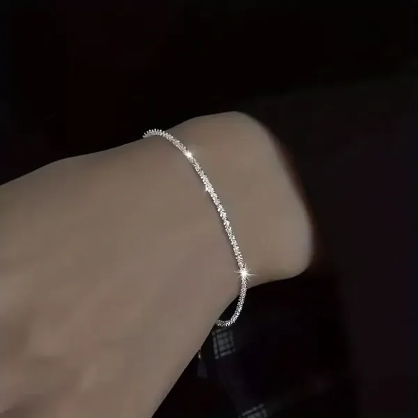 Skinnende armbånd